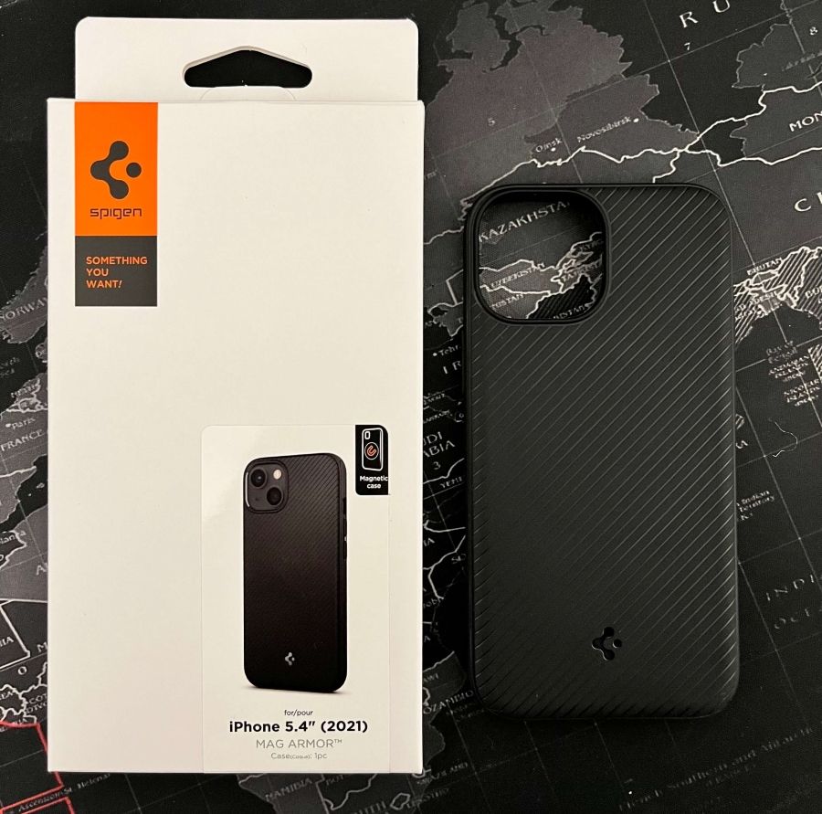 Picture of the Spigen Mag Armor case next to its packaging